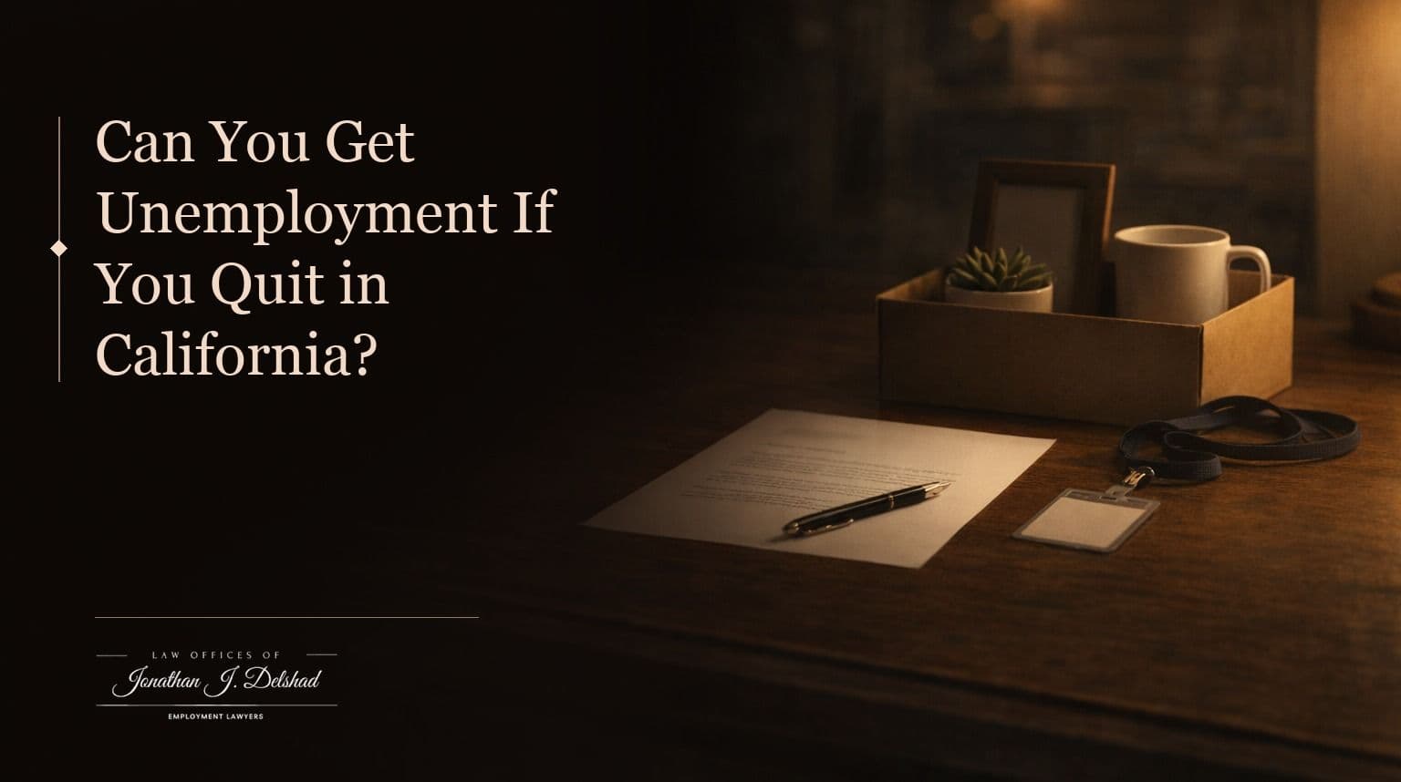 A resignation letter and pen on a dark wooden desk beside a box of personal desk items and an office lanyard