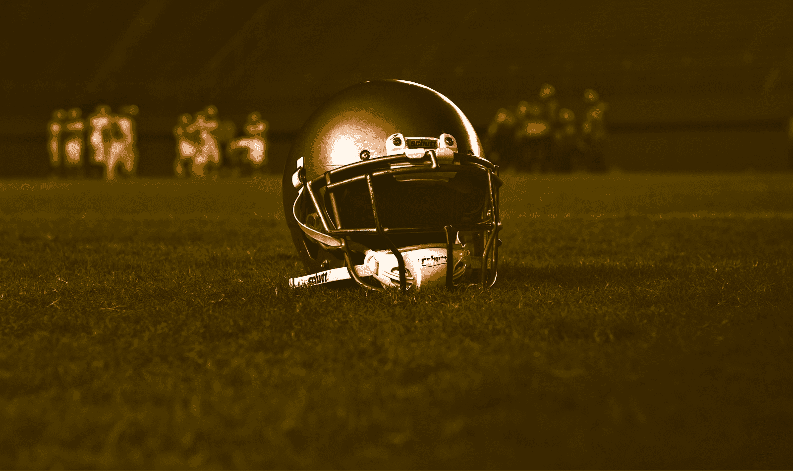 Football helmet on the field