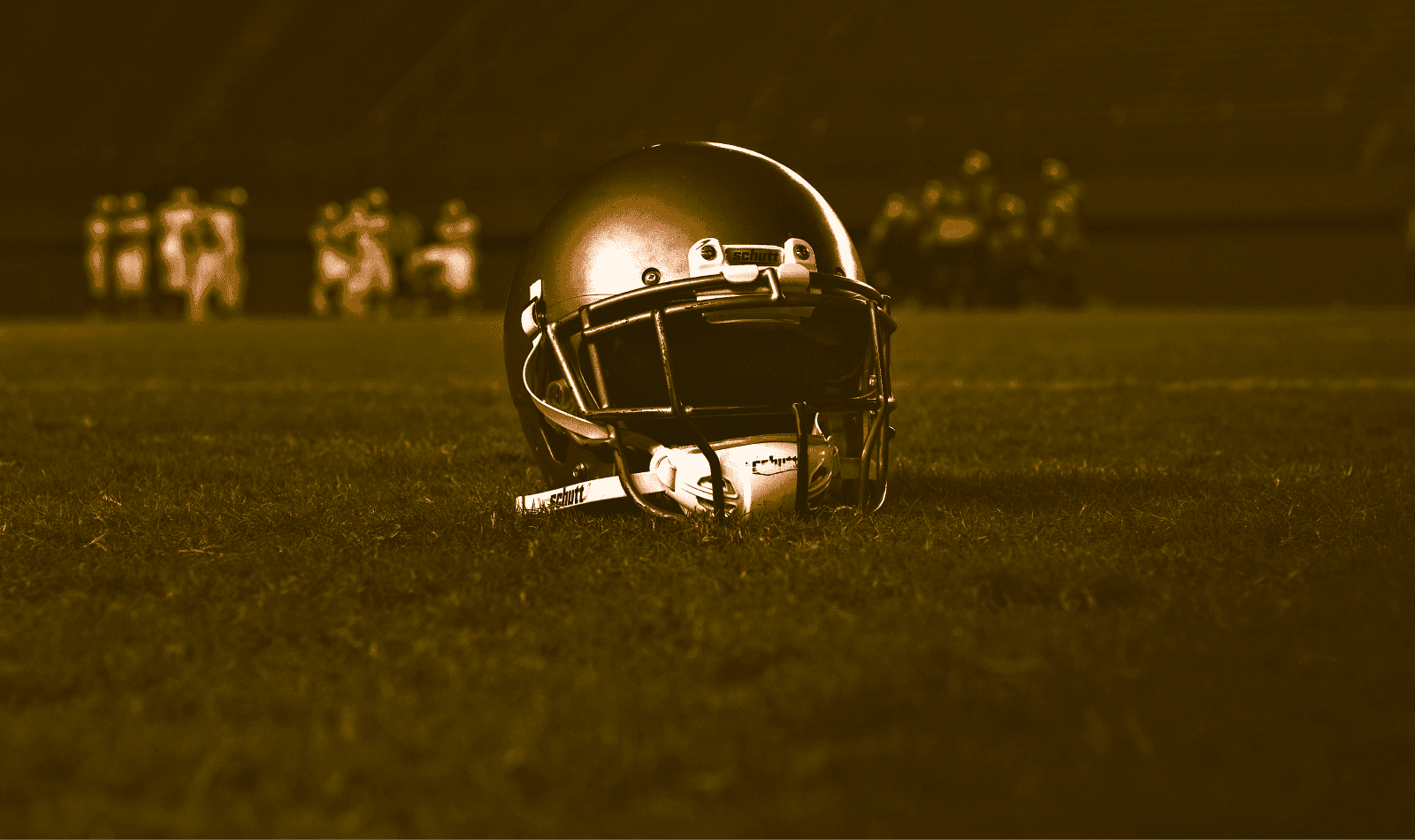 Football helmet on the field